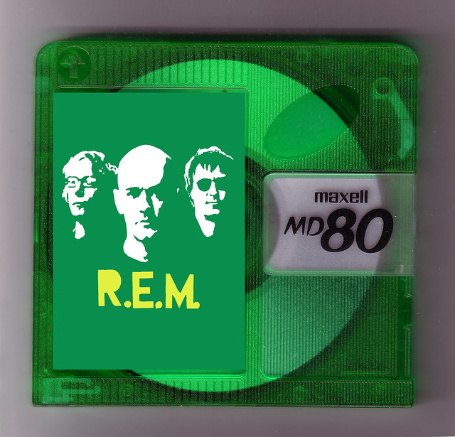 Maxell 80 minute green MiniDisc with R.E.M. label overlay
