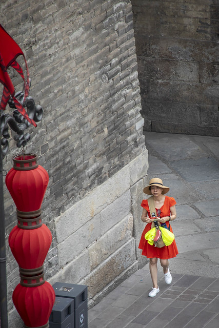 Woman in red at the City Wall in Xian
