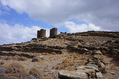 Ruins of abandoned windmills on a ridge line outside Pyrgos, Tinos