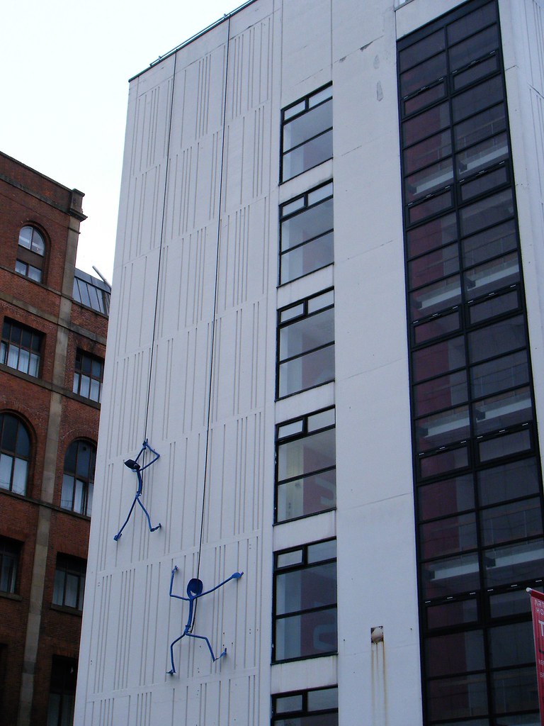 Manchester, Street Art = climbers on tall building = or abseilers ?