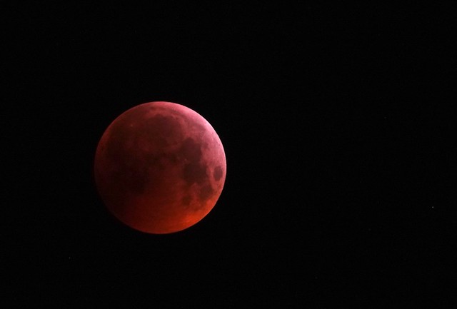 Possible Meteorite impact during lunar eclipse