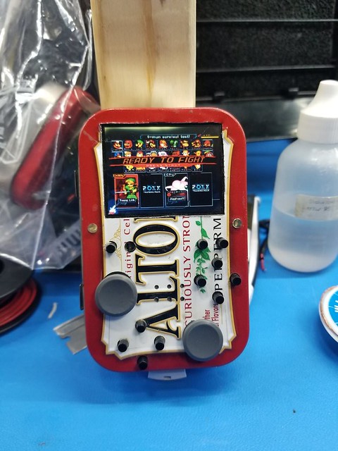 The KillMii is finished! It's a fully functional Wii portable inside an actual Altoids tin. It runs hot, has a 10 minute battery life, and awful controls, but it's a real Wii inside (not an emulator.) It's the worst thing ever! **Video in description!**