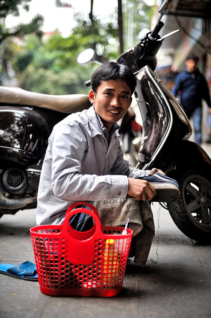 Street cobbler, Hanoi