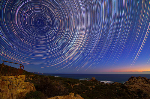 star trails cape naturaliste dunsborough sugarloaf rock cosmology southern hemisphere cosmos tracing startrailsexe circles tracks stacked stacking stack western australia dslr long exposure rural tokina 1116mm nightphotography nikon stars astronomy space galaxy astrophotography landscape d5100 sea ocean