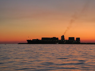 Container ship passing the jetty in Mersin, Turkey