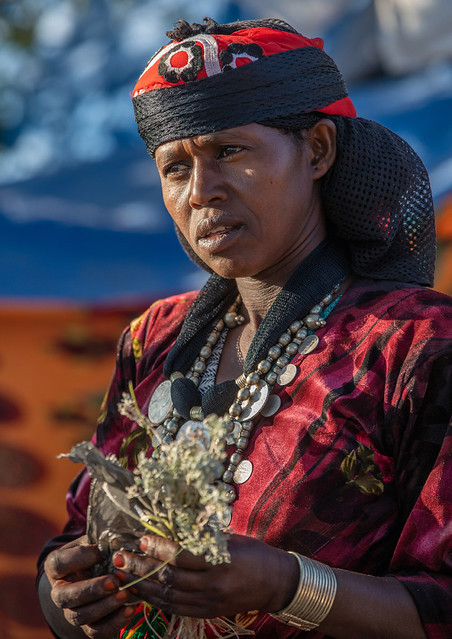 Oromo woman with a necklace made of maria theresa thalers, Amhara region, Senbete, Ethiopia