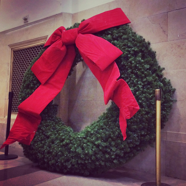 Giant wreath, slouched against the wall waiting to be hung.