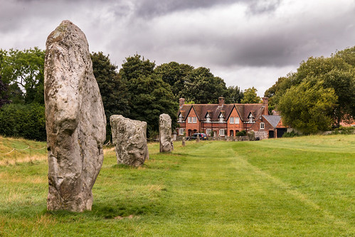 avebury stonecircle wiltshire standing stone grass field ancient english heritage nationaltrust building megalithic tree sky landscape neolithic bronzeage