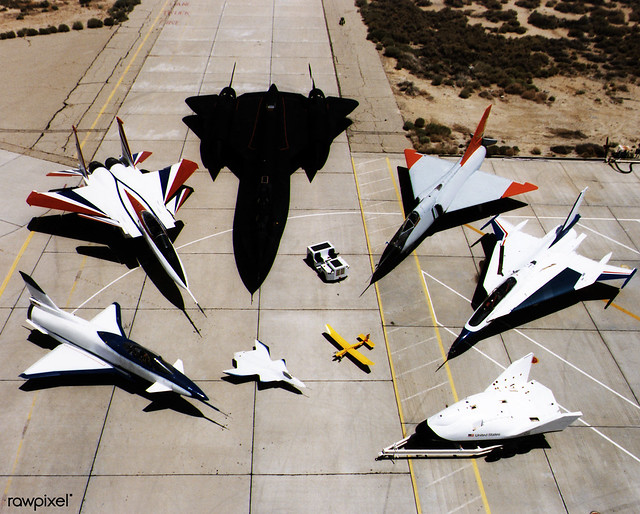 Collection of NASA's research aircraft on the ramp at the Dryden Flight Research Center: X-31, F-15 ACTIVE, SR-71, F-106, F-16XL Ship #2, X-38, Radio Controlled Mothership and X-36, 07/16/1997. Original from NASA. Digitally enhanced by rawpixel.