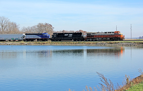 norfolksoutherntrains norfolksouthern reflectionphotographs reflectionphotography nsheritagelocomotives nsheritageunits nsinterstateheritageunit nsinterstateheritagelocomotives water ponds nssanduskydistrict
