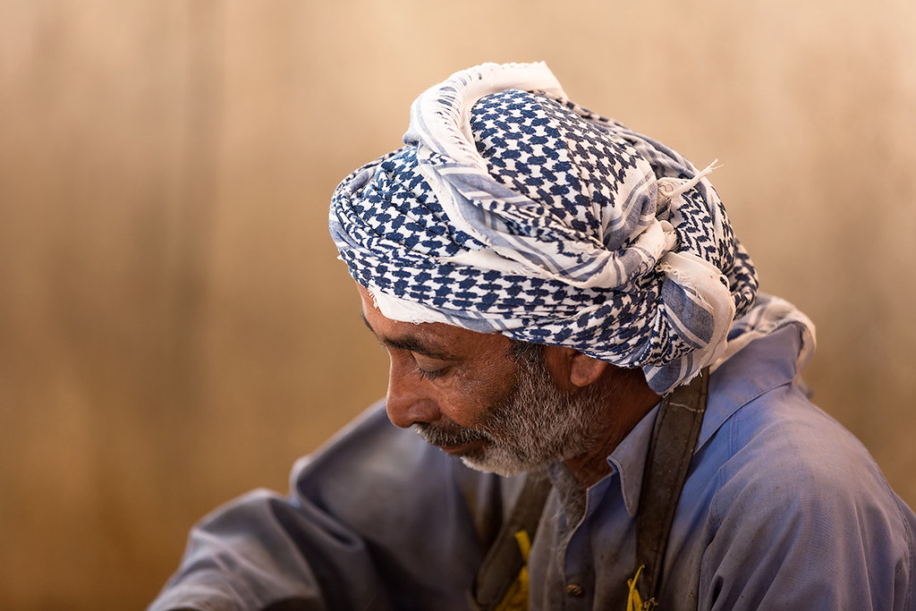 A vendor at Muttrah fish market in Muscat, Oman.