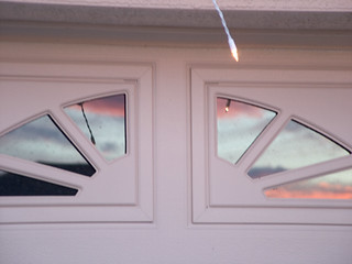sunset reflected off garage door