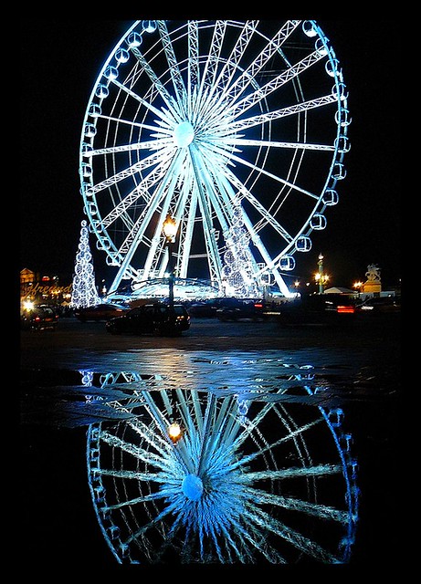 Paris by night - La Grande Roue (reflected in puddle)