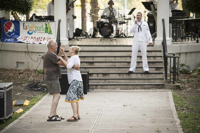 A couple dances to the music of the Navy Band Great Lakes.