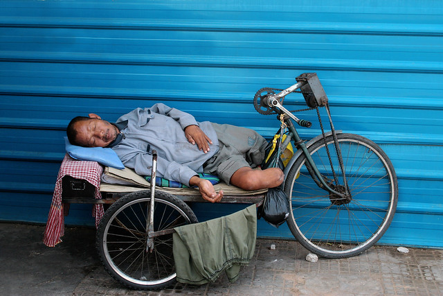 A landmine victim sleeping in Phnom Penh, Cambodia.