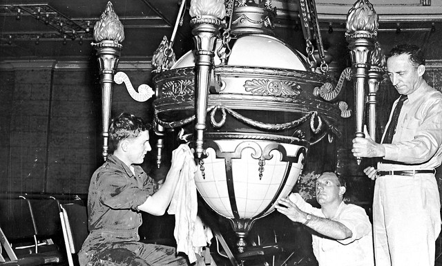 Cleaning a chandelier at Town Hall,  Newcastle, NSW, [1954]