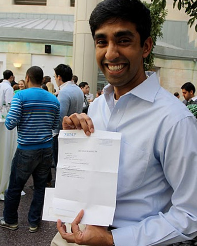 Shyam Tanguturi shows off his match letter.