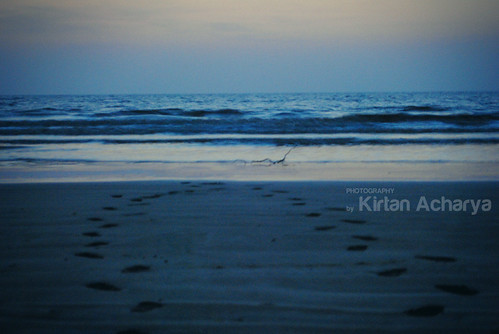 Umargaon Beach by Kirtan Acharya, sunset footsteps sandprints umargaon