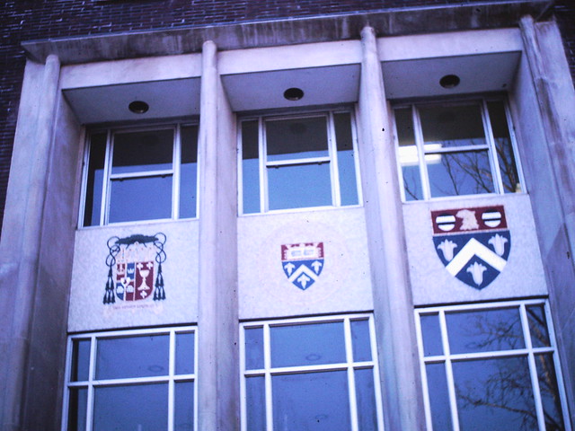Emblems above McEntegart Library front doors