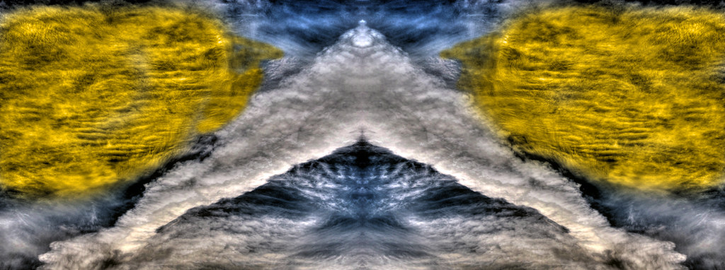 Gigantic Cloud Figures Astride the Parking Lot Handheld HDR Panorama by Walker Dukes