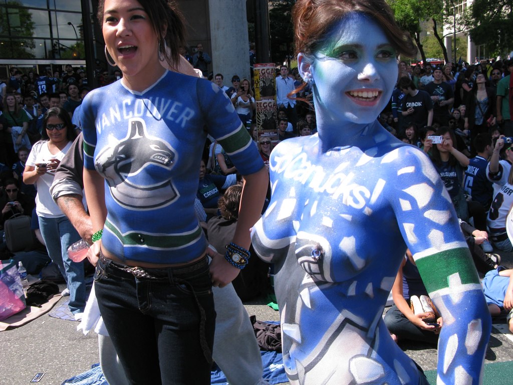 Topless body painted young women with perfect breasts painted in Vancouver ...