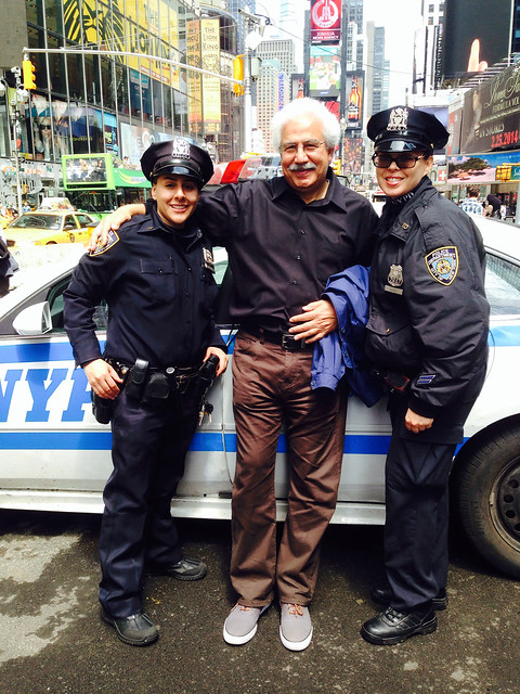 With two cute police women in time square NY on May 1, 2014