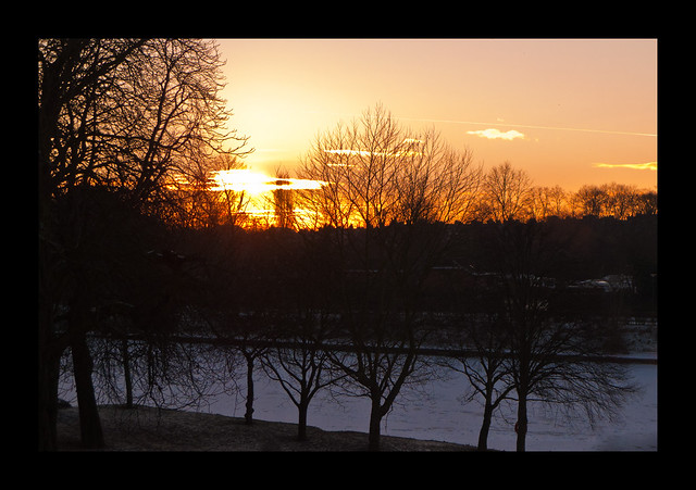 Sunset over a frozen river