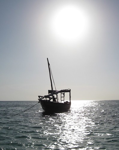sea sun silhouette boat zanzibar dhow