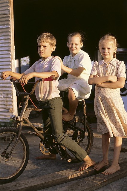 Copyrighted: All Rights Reserved JK002863 - Three Amish children with a bicycle, Belize