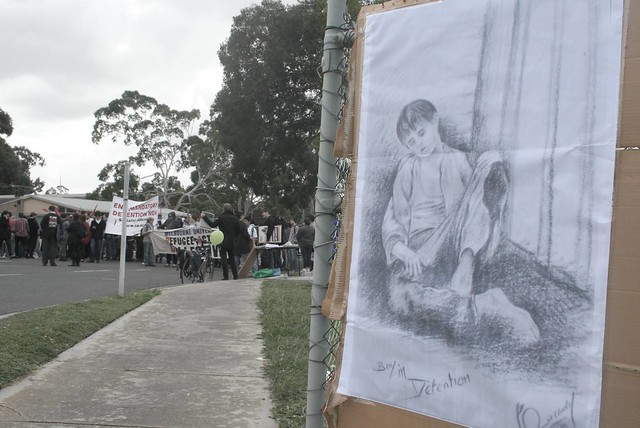 Boy in Detention banner - Refugee Children in Immigration Detention Protest Broadmeadows