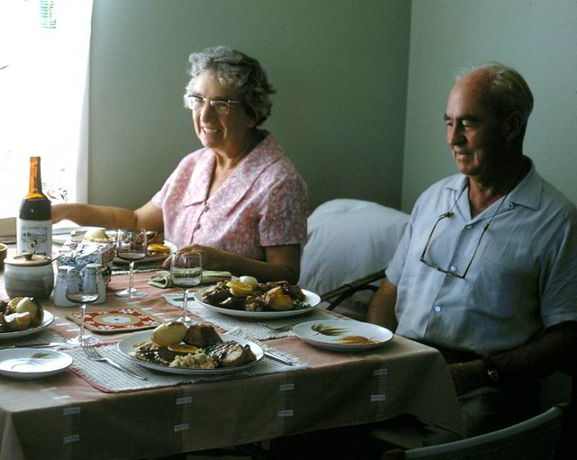 Mum and Dad with the Sunday roast at Pearce, Easter 1969