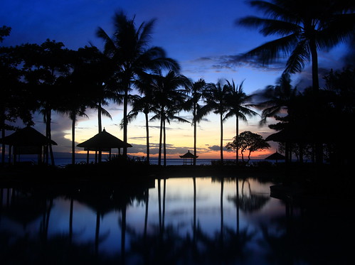 blue trees vacation sky bali holiday reflection silhouette indonesia dawn hotel asia lagoon palm resort hour conrad moning