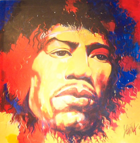 Close-up musician portrait against red and yellow