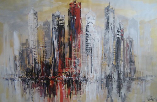 Tall grey towers with red and blue accents