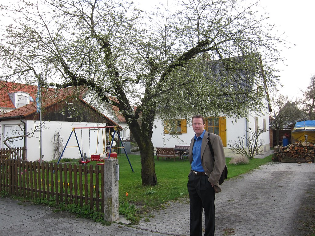 Cute little house with an apple tree and Steve