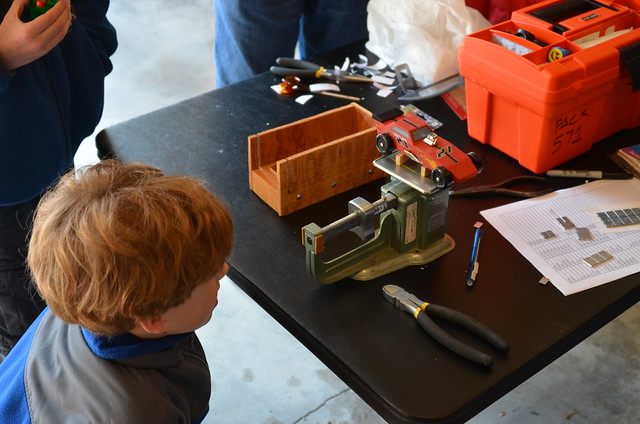 Jameson weighing in his Pinewood Derby car