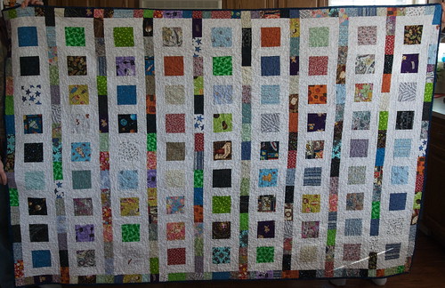 Stargirl is ready to go home with Crystal. It's my first quilt made, start to finish, after Jeff's accident.

For the details on this quilt, why it matters, and why it has the fabrics it does: domesticat.net/quilts/stargirl
