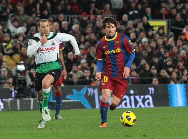 Mehdi Lacen, Lionel Messi and Andres Iniesta netted as Barcelona recorded a record 14th straight league . Barcelona