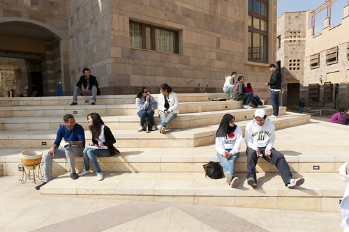 Students sitting on the stairs of the School of Sciences and Engineering