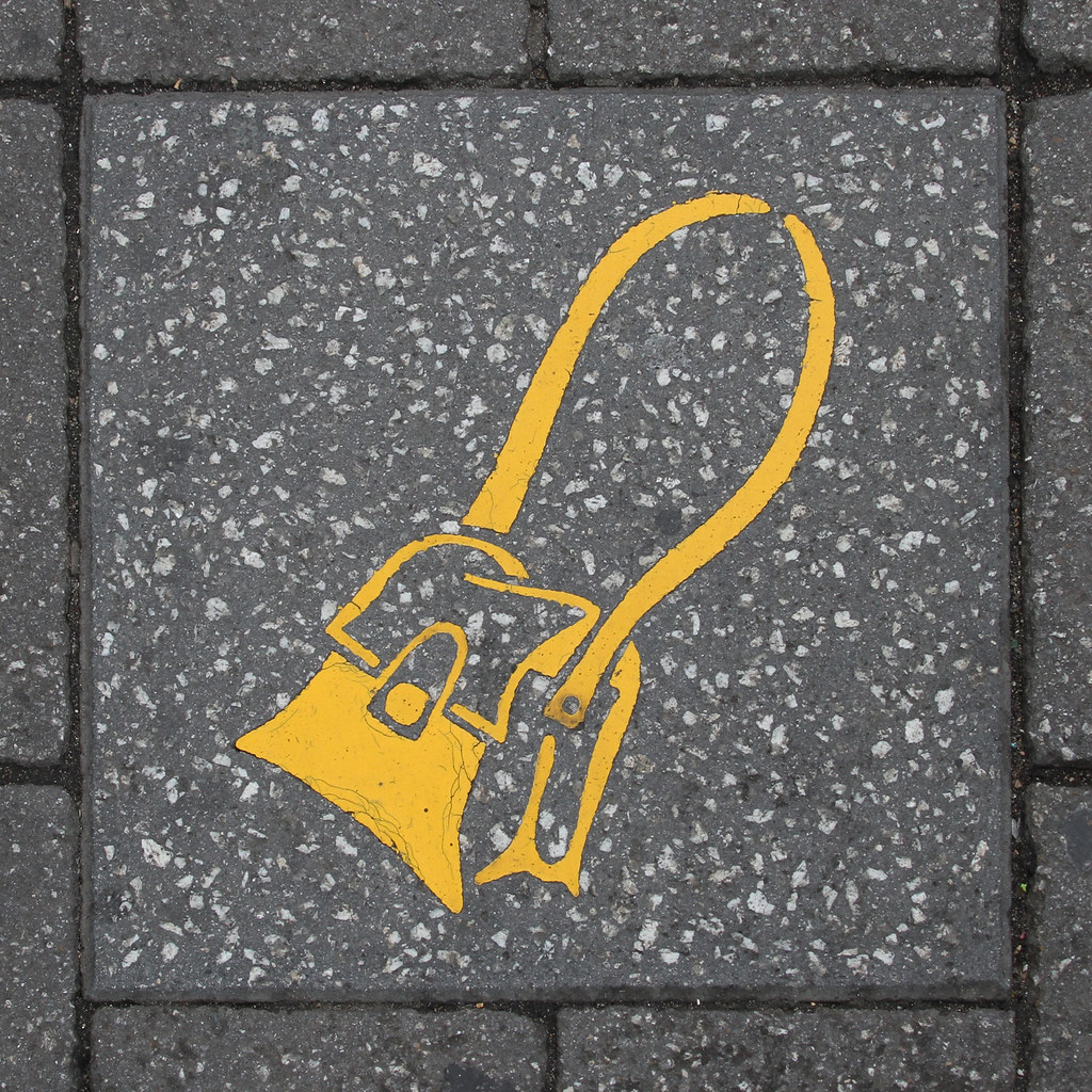 paving slab motif - yellow handbag