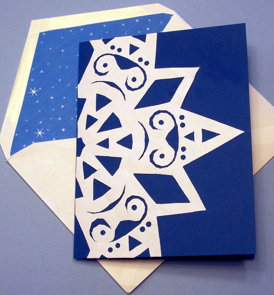 Decorate card with paper snowflake