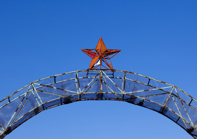 Rusty Red Star Sign In Kochkor, Kyrgyzstan