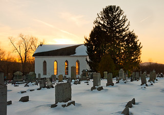 Sunset on a Snowy Cemetery