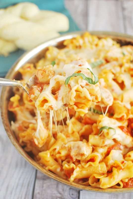 Chicken Parmesan Baked Pasta - easy baked pasta with chicken, tomato sauce, mozzarella, and Parmesan. My kids love this! 