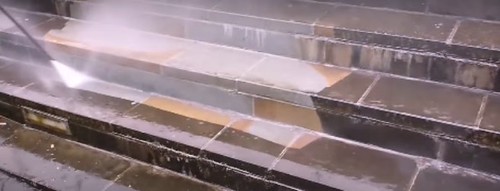 Concrete surface with a heat gun in use (example image)