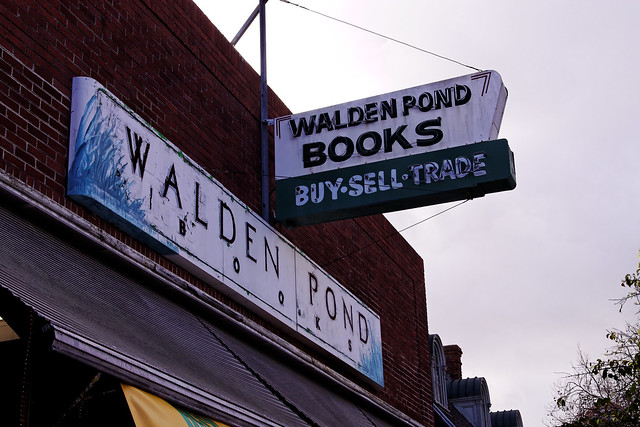 Signs for Walden Pond Books in the Grand Lake District of Oakland