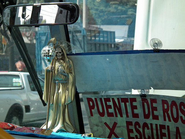 La Santa Muerte Figurine in a Bus, Mexico City (2010)