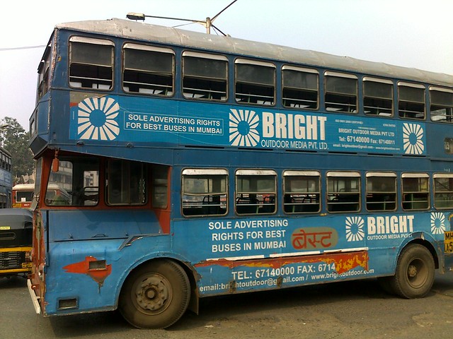 'Advertisement of the Advertiser' A Fully clad old Double Decker enteres Kurla Station West
