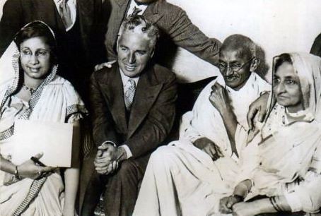 Charlie Chaplin with Mahatma Gandhi in Canning Town London 1931