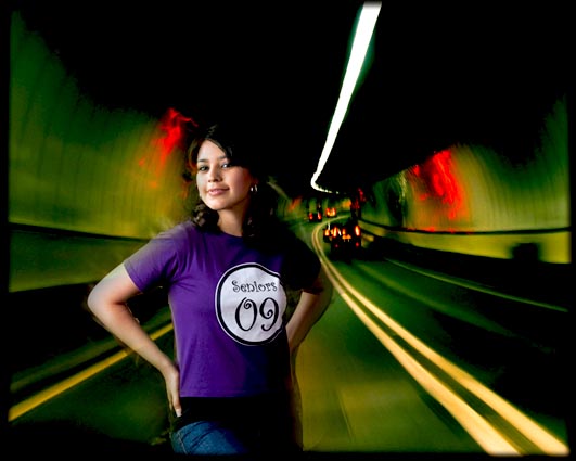 Girl Standing in Middle of Road Tunnel Senior Portrait